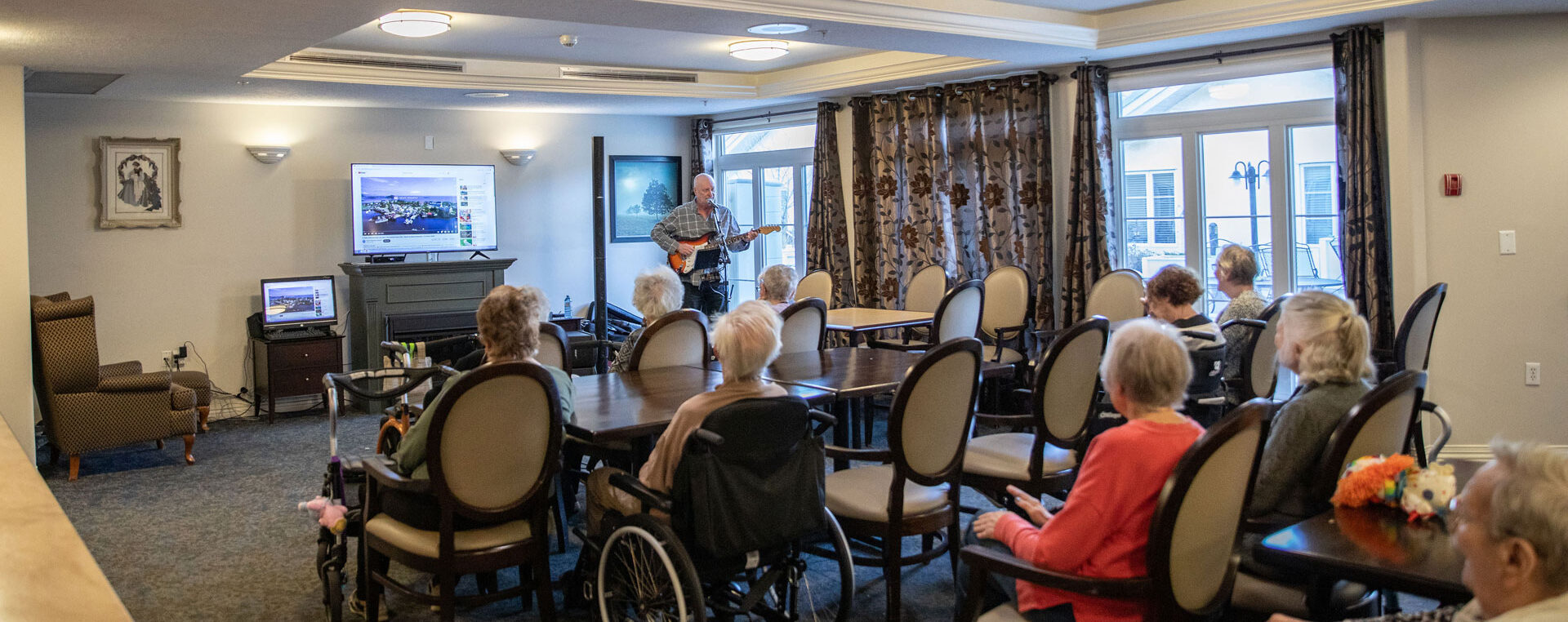 residents enjoying live music e1781044331745