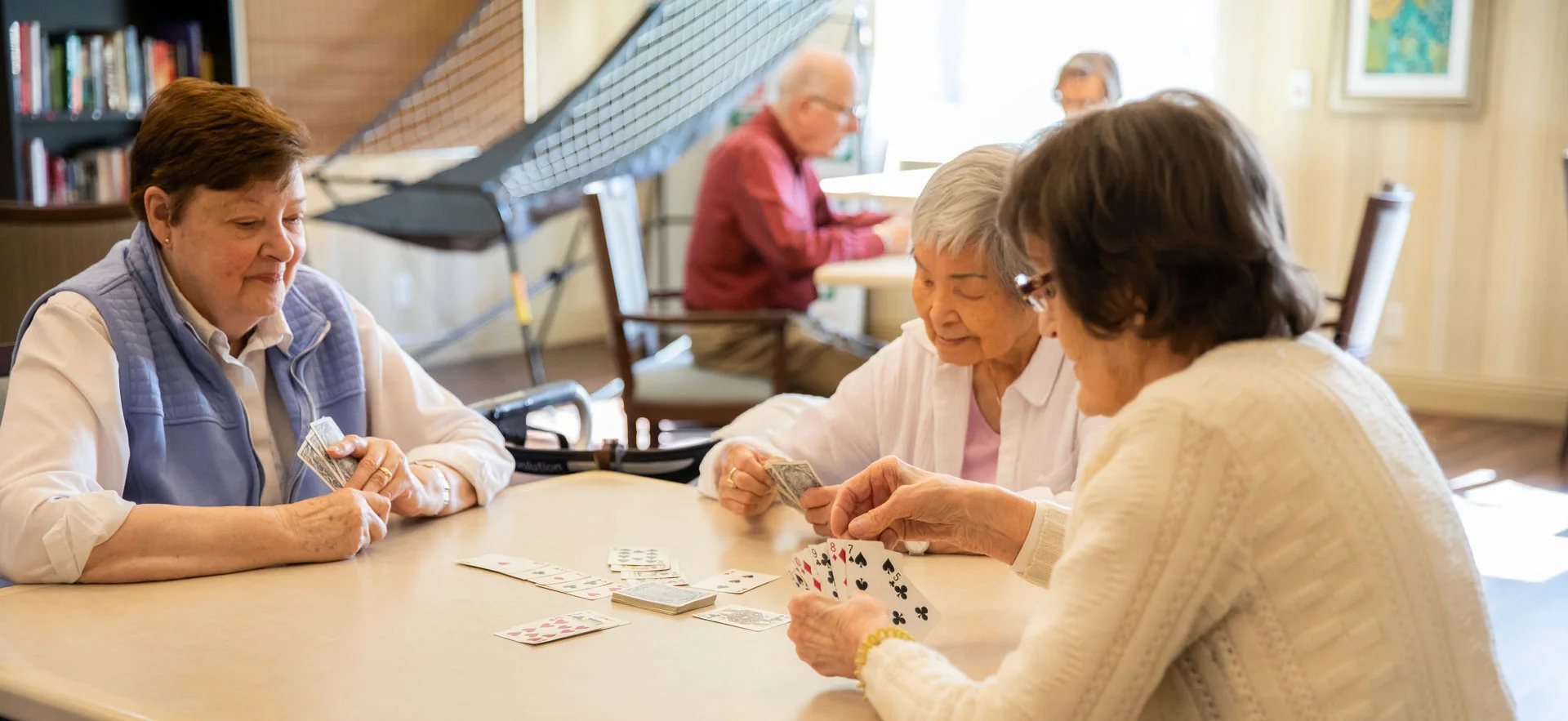 residents enjoying card game